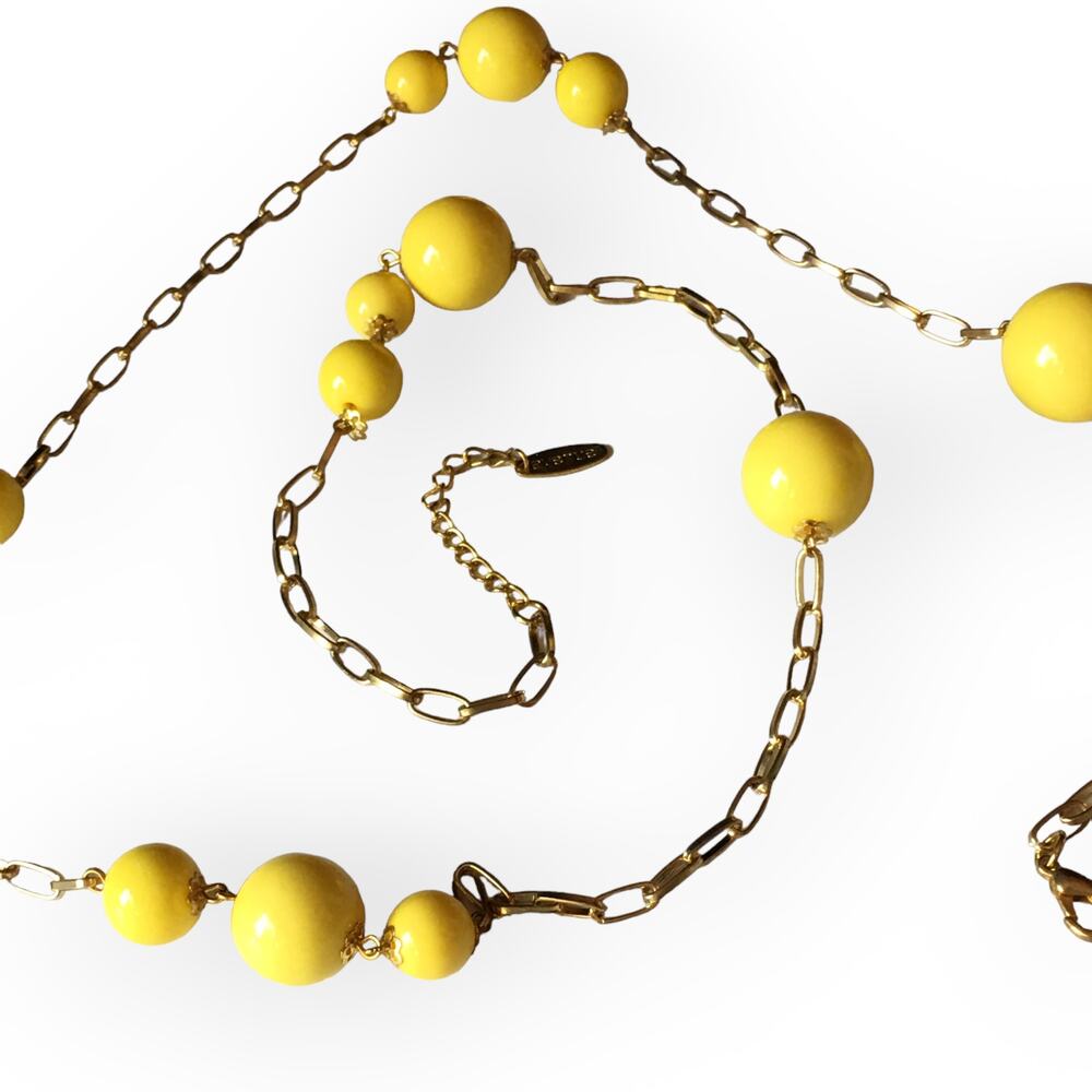AVENUE sunny yellow and gold tone long station necklace